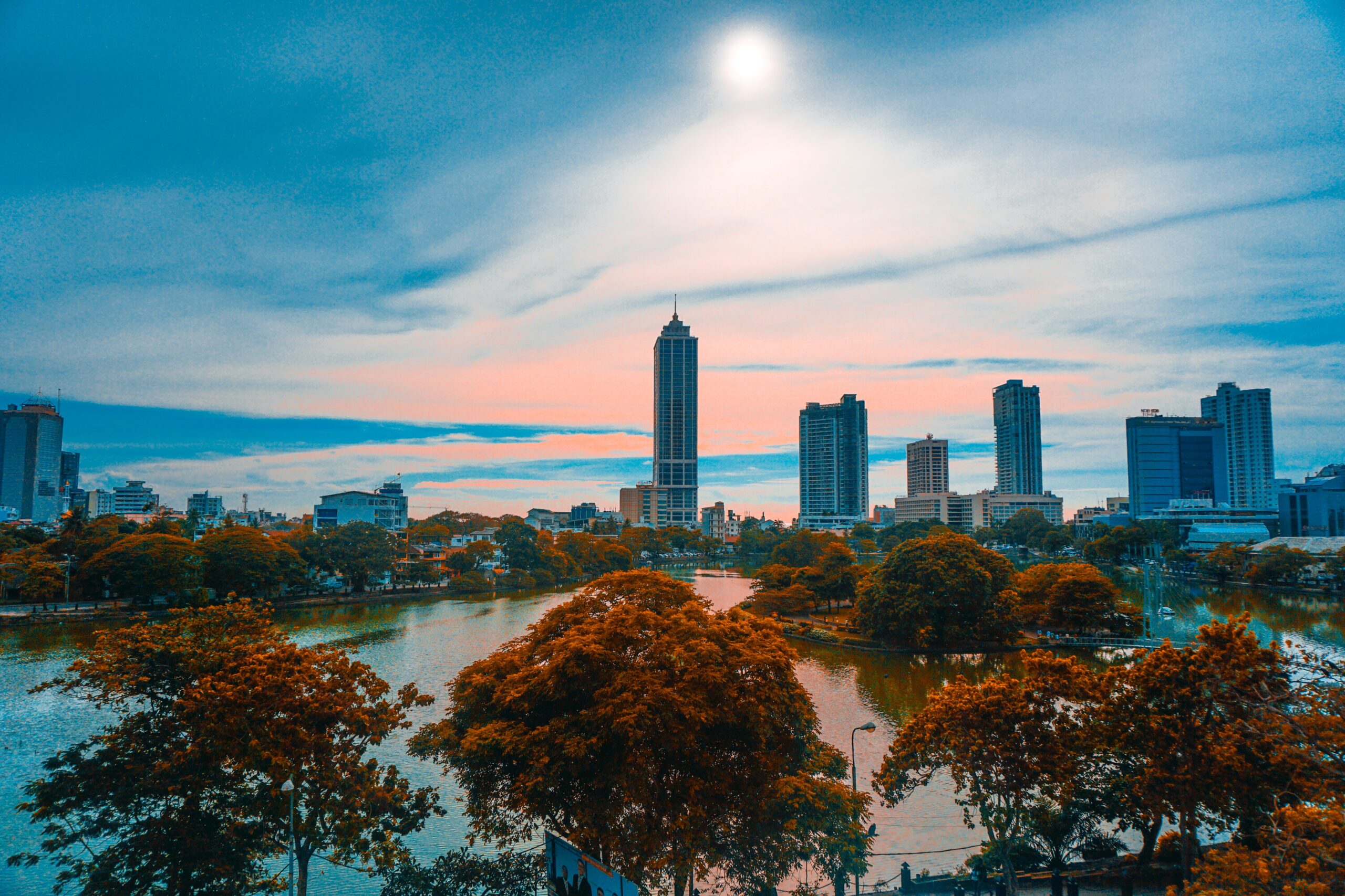 view of skyscrapers in front of river at a distance