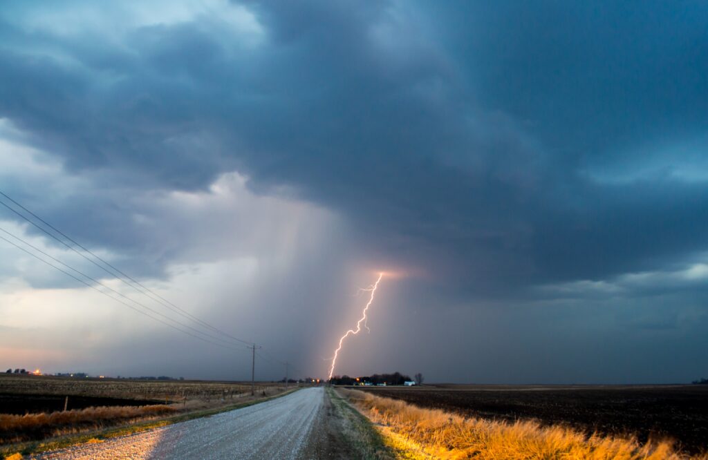 lightning striking ground in countryside